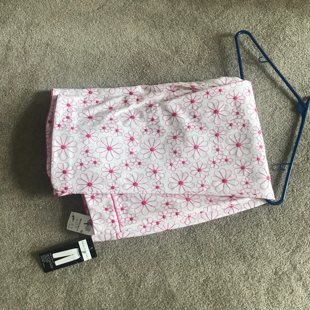 Brand new pants whit pants with pink flowers